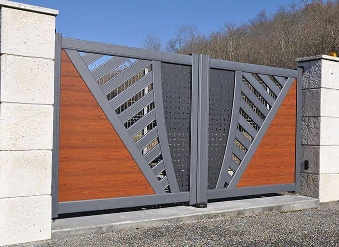 Modern charcoal and wood gate with geometric inlay